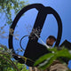 Person holding a metal detector VLF coil